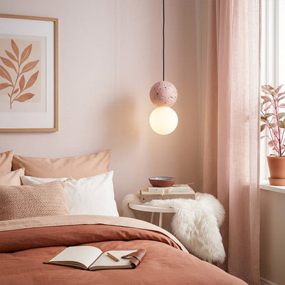 Norra Pink concrete mini pendant pair hanging beside bed instead of bedside lamps modern girly bedroom