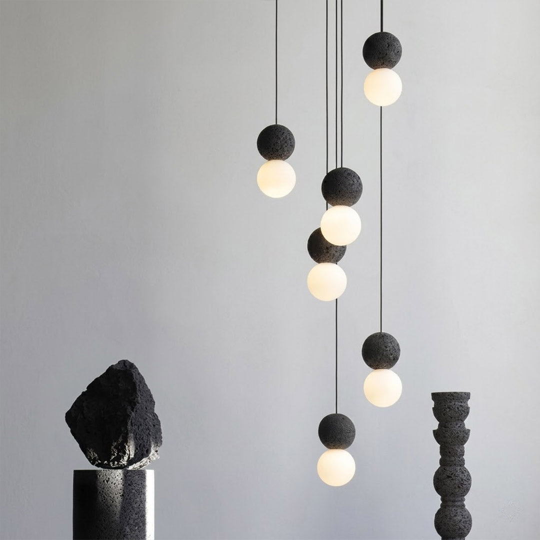 Norra concrete mini pendant cluster staircase stairwell vertical hanging different heights statement modern interior