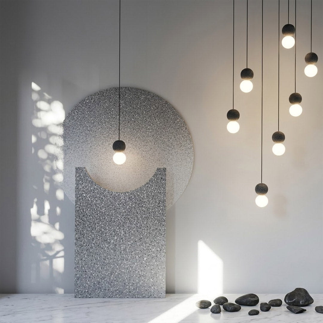 Norra concrete mini pendant cluster staircase stairwell vertical hanging different heights statement modern interior