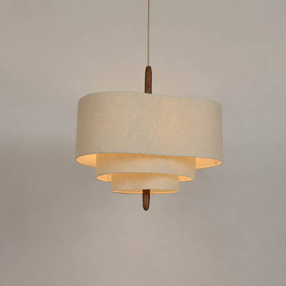 Nuvola pendant light small 17.7 inch diameter multi-layered off-white fabric shade walnut wood accent mid-century modern boho Japandi soft warm dining bedroom white background
