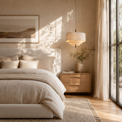 Nuvola pendant light medium modern primary bedroom over bed statement hanging soft multi-layered fabric shade walnut accent mid-century boho warm ambient intimate cozy sophisticated American home lifestyle interior