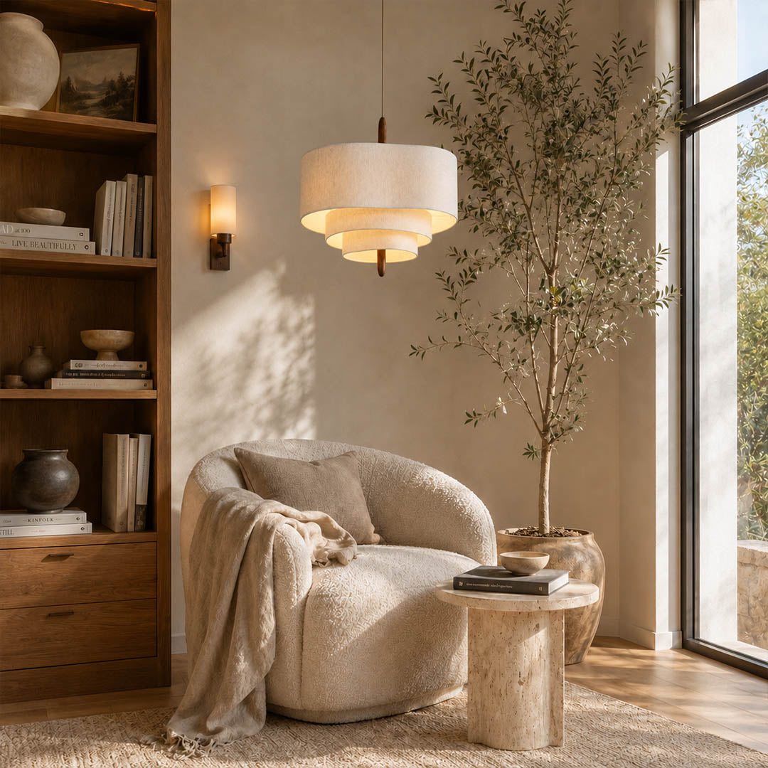 Nuvola pendant light modern Japandi neutral interior hanging soft multi-layered fabric shade walnut accent mid-century warm ambient sophisticated cozy calm American home lifestyle interior