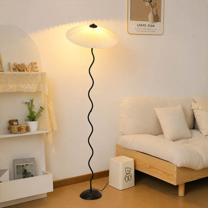 Onda floor lamp beige modern living room sofa side sculptural squiggle wavy black metal base fabric drum shade postmodern Memphis inspired statement warm ambient lifestyle interior