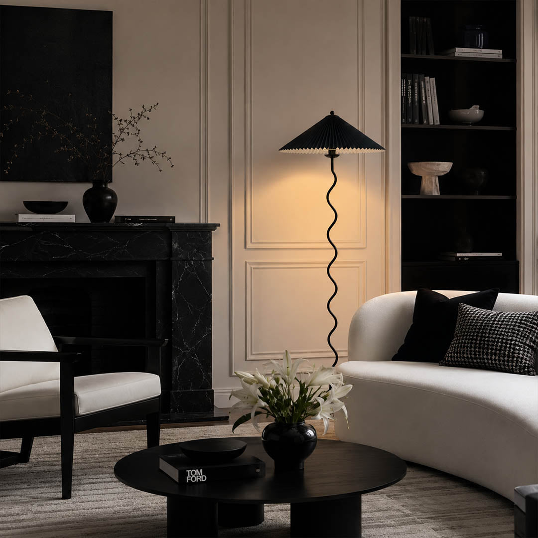 Onda floor lamp beige modern living room sofa side sculptural squiggle wavy black metal base fabric drum shade postmodern Memphis inspired statement warm ambient lifestyle interior