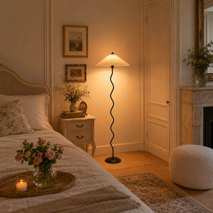 Onda floor lamp beige boutique hotel guest room hospitality sculptural squiggle wavy black metal base fabric drum shade postmodern Memphis inspired statement warm ambient lifestyle interior