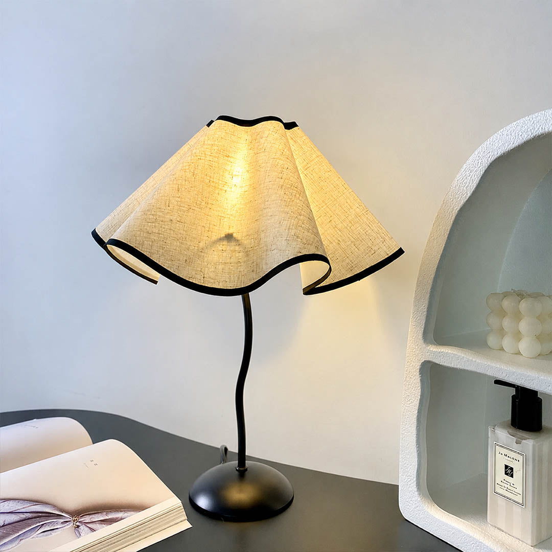 Onda table lamp modern library bookshelf accent statement vintage inspired warm ambient sculptural squiggly base pleated shade elegant intimate lifestyle interior