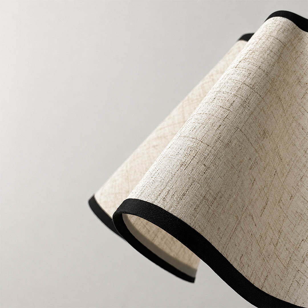 Onda table lamp white linen pleated fabric shade handcrafted vintage inspired soft diffused warm glow detail close up craftsmanship