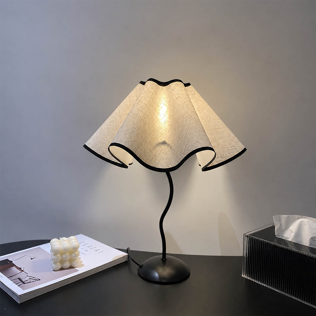 Onda table lamp modern library bookshelf accent statement vintage inspired warm ambient sculptural squiggly base pleated shade elegant intimate lifestyle interior