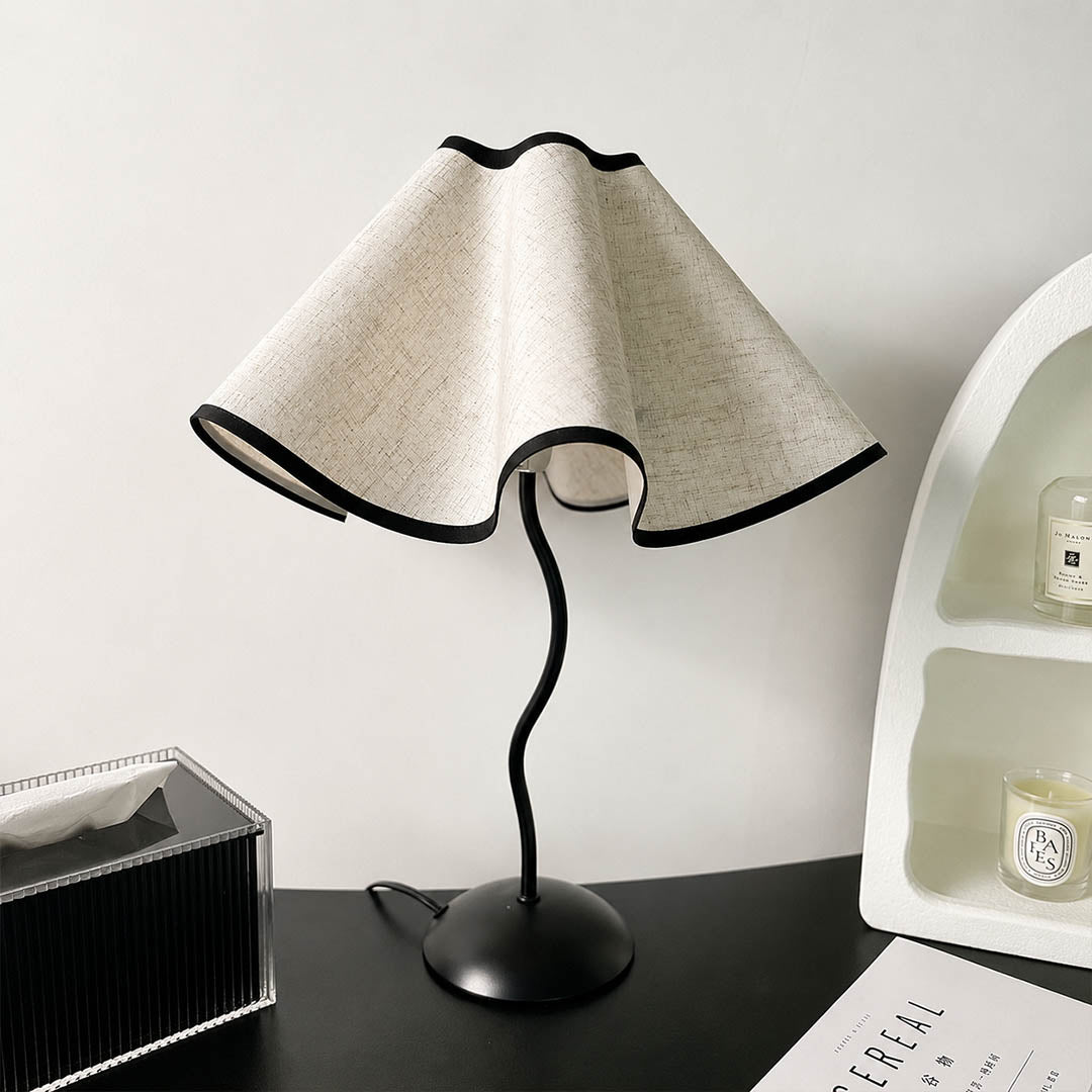 Onda table lamp modern library bookshelf accent statement vintage inspired warm ambient sculptural squiggly base pleated shade elegant intimate lifestyle interior