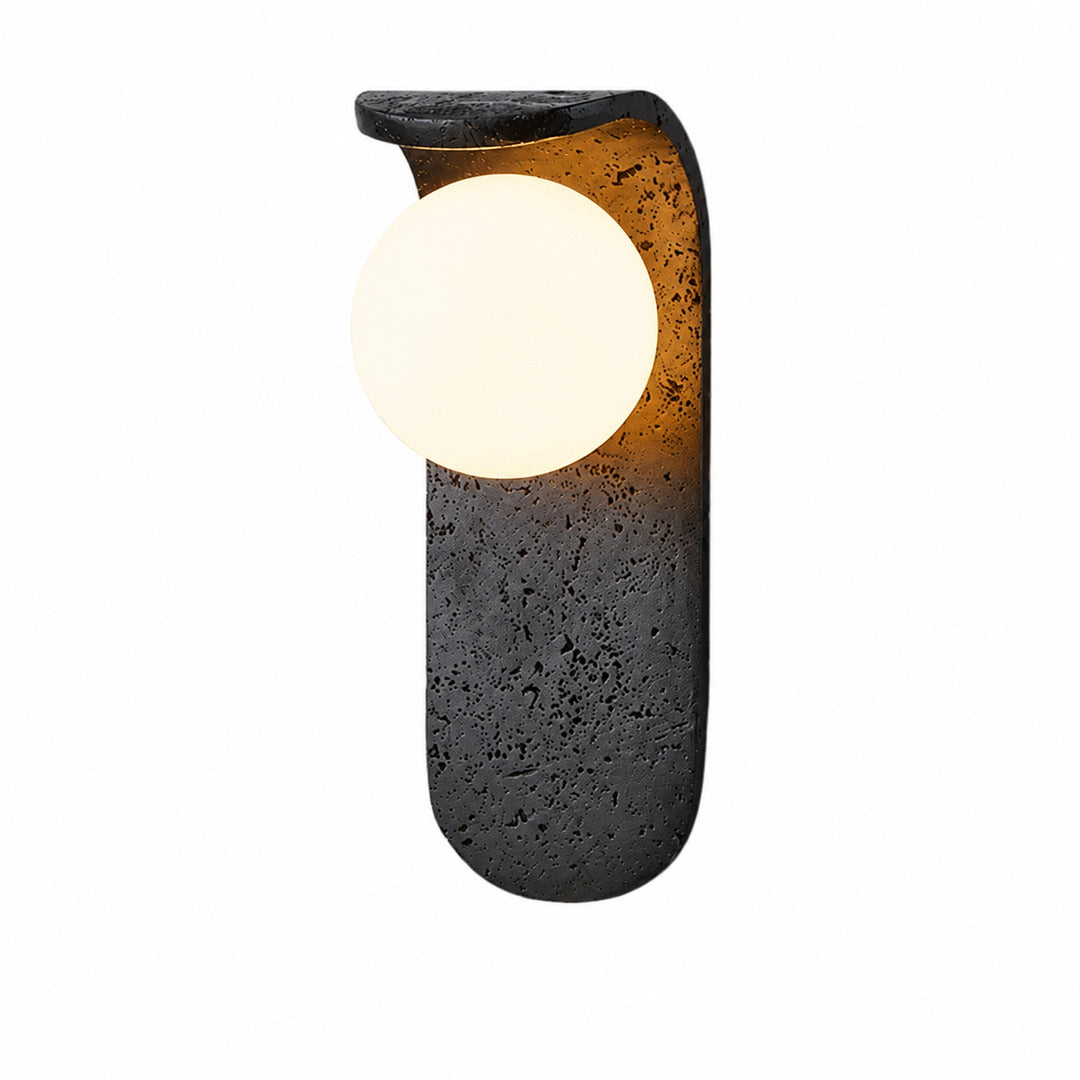 Notte travertine wall sconce black travertine stone orb sphere minimalist sculptural white background
