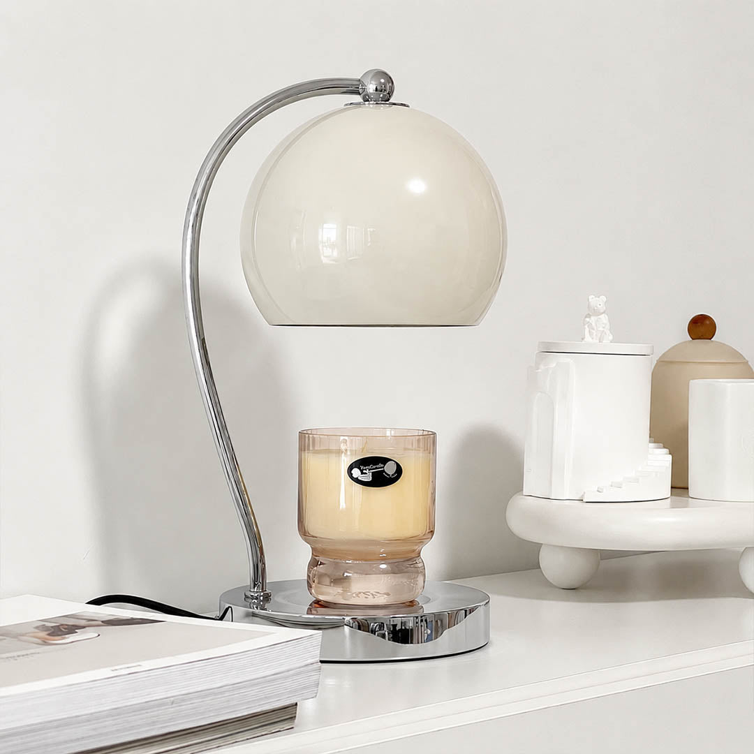 Orbet sphere candle warmer lamp study desk scent warming warm glow chrome cute relaxing American home lifestyle interior