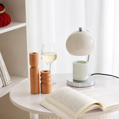 Orbet sphere candle warmer lamp study desk scent warming warm glow chrome cute relaxing American home lifestyle interior