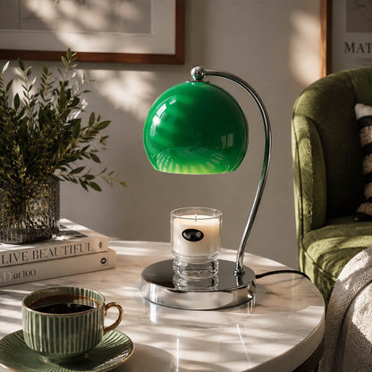 Orbet sphere candle warmer lamp living room side table scent warming warm glow chrome cute modern American home lifestyle interior styled