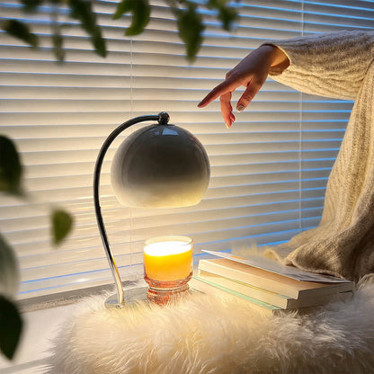 Orbet sphere candle warmer lamp study desk scent warming warm glow chrome cute relaxing American home lifestyle interior