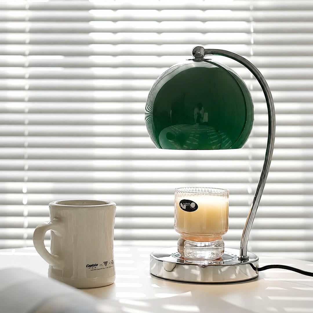 Orbet sphere candle warmer lamp study desk scent warming warm glow chrome cute relaxing American home lifestyle interior
