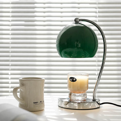 Orbet sphere candle warmer lamp study desk scent warming warm glow chrome cute relaxing American home lifestyle interior