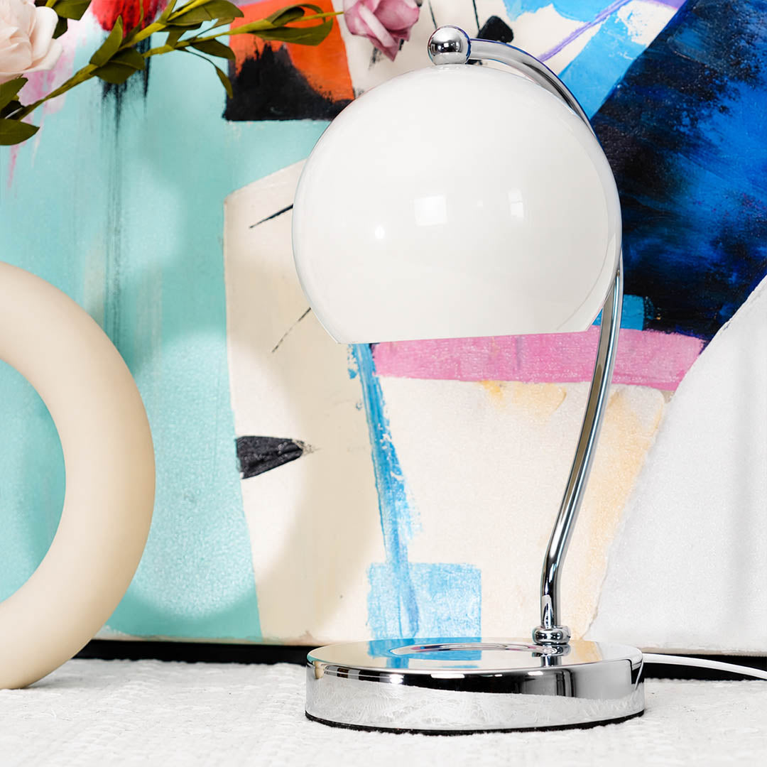 Orbet sphere candle warmer lamp spherical shade chrome base cute rounded form detail close up