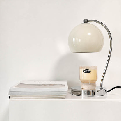 Orbet sphere candle warmer lamp study desk scent warming warm glow chrome cute relaxing American home lifestyle interior