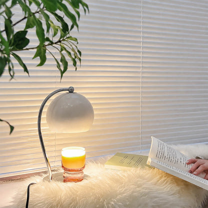 Orbet sphere candle warmer lamp study desk scent warming warm glow chrome cute relaxing American home lifestyle interior