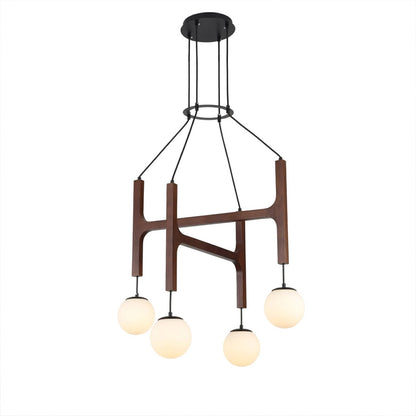 Orbit walnut orb chandelier above dining table warm frosted globe glow organic modern interior