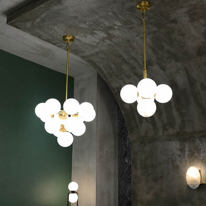 Orbita alabaster globe pendant light galactic cluster brass rods spheres structure top view arrangement detail sculptural