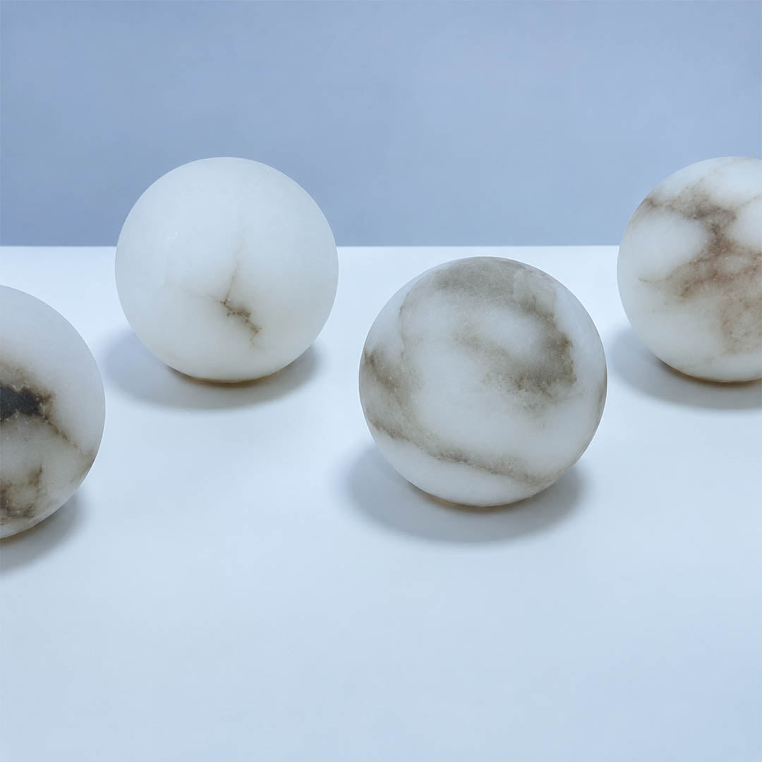 Orbita alabaster globe pendant light galactic cluster brass rods spheres structure top view arrangement detail sculptural