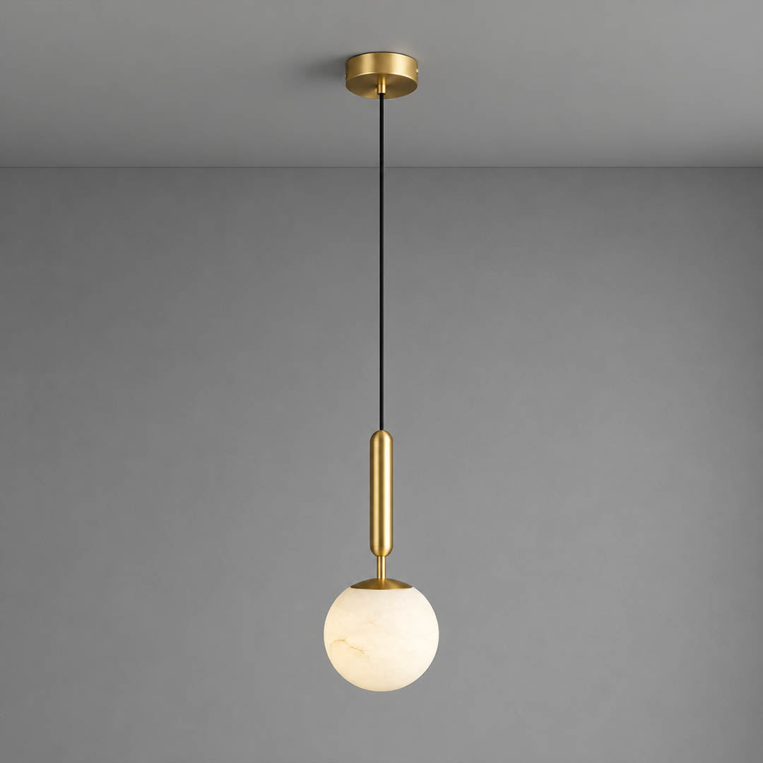 Orbita alabaster globe pendant light single ball long drop natural stone sphere brass rod cord white background front view