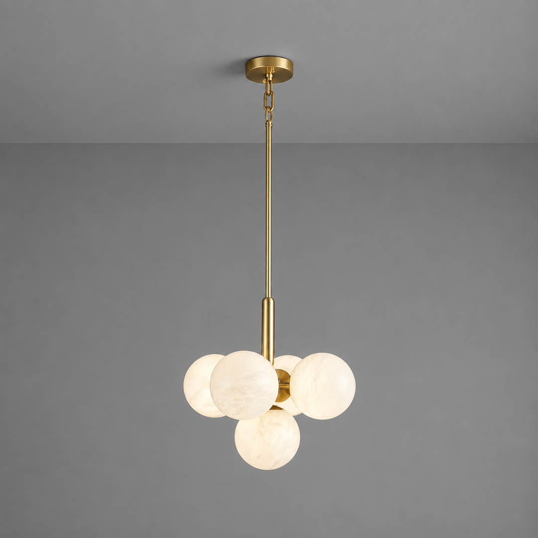 Orbita alabaster globe pendant light five balls round cluster natural stone spheres brass galactic white background front view