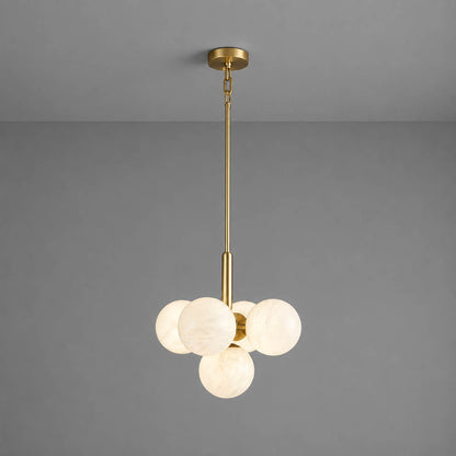 Orbita alabaster globe pendant light five balls round cluster natural stone spheres brass galactic white background front view