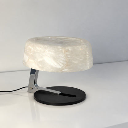 Close-up of the milky white alabaster shade of the Orbita lamp unlit