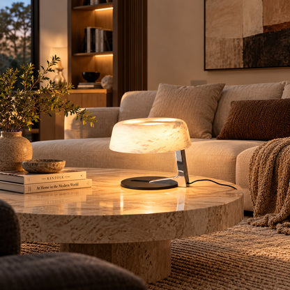 Orbita alabaster table lamp on a side table in a modern living room