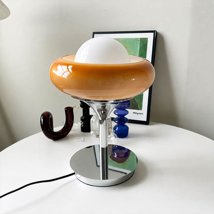 Orbita table lamp modern primary bedroom bedside nightstand chrome orange space age 1970s Italian mid century modern warm ambient intimate cozy sophisticated lifestyle interior American home