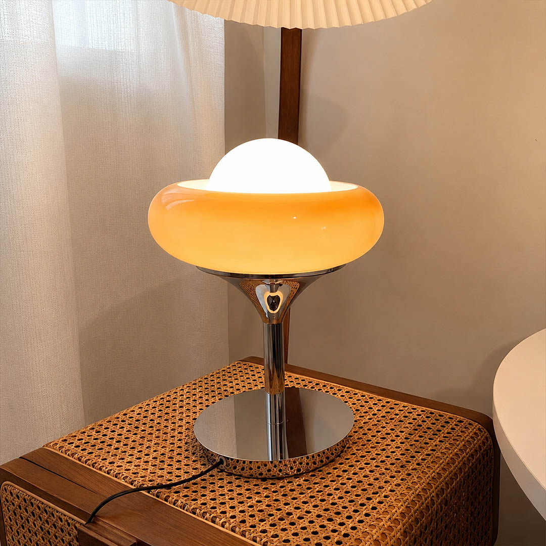 Orbita table lamp modern primary bedroom dressing table vanity chrome orange space age 1970s Italian mid century modern warm ambient morning routine feminine sophisticated lifestyle interior American home