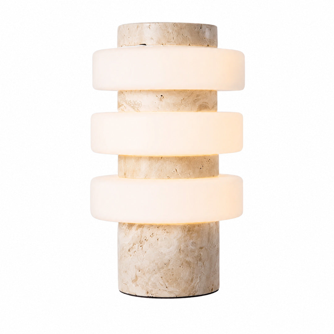 Orbita travertine table lamp yellow travertine stone base glowing glass rings sculptural saturn minimalist white background