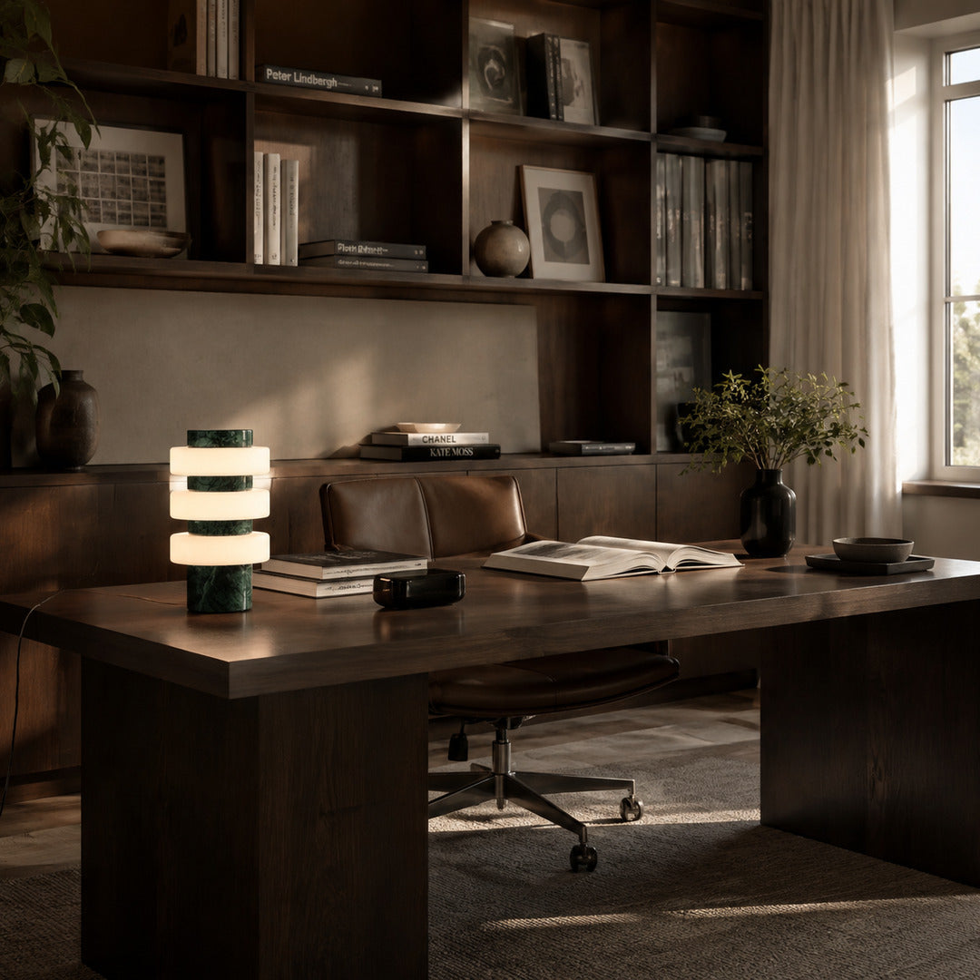 Orbita travertine table lamp study desk warm glow travertine stone glass sculptural American home lifestyle interior styled