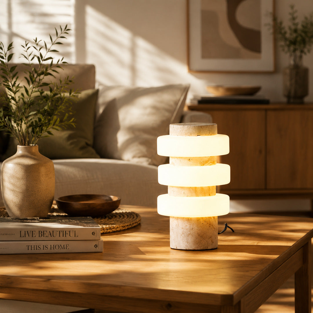 Orbita travertine table lamp living room side table warm glow travertine stone glass rings American home lifestyle interior styled