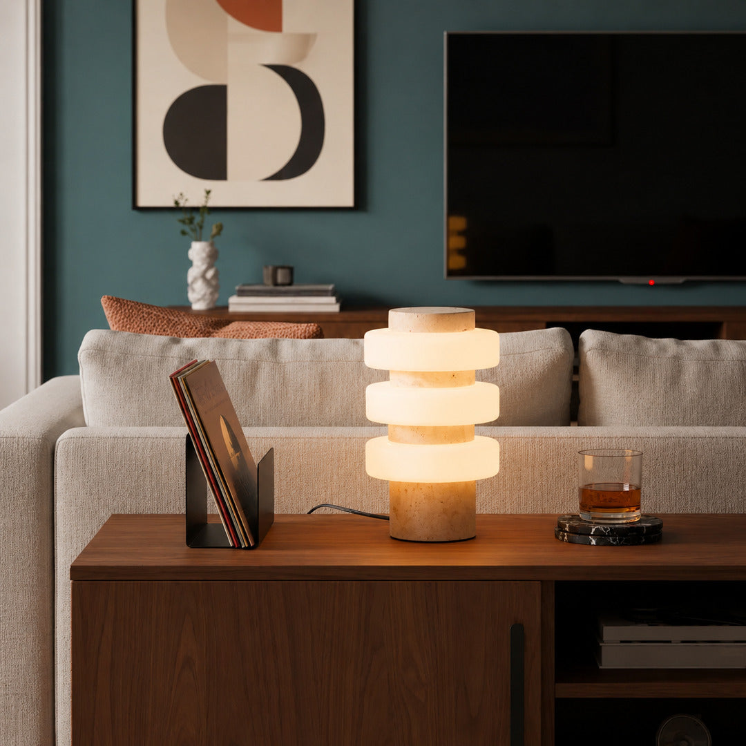 Orbita travertine table lamp living room side table warm glow travertine stone glass rings American home lifestyle interior styled
