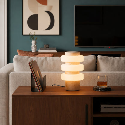 Orbita travertine table lamp living room side table warm glow travertine stone glass rings American home lifestyle interior styled