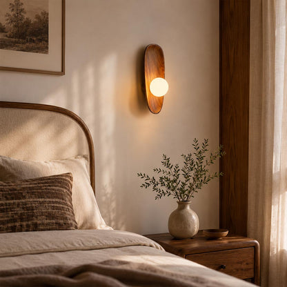 Ovi wood wall lamp walnut pair boutique cabin rental guest room bedside frosted glass globe warm wabi sabi hospitality American commercial interior