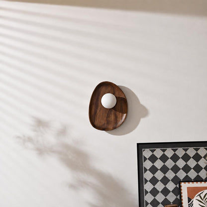 Ovi wood wall lamp walnut pair tv feature accent wall living room frosted glass globe mid century warm American home lifestyle interior