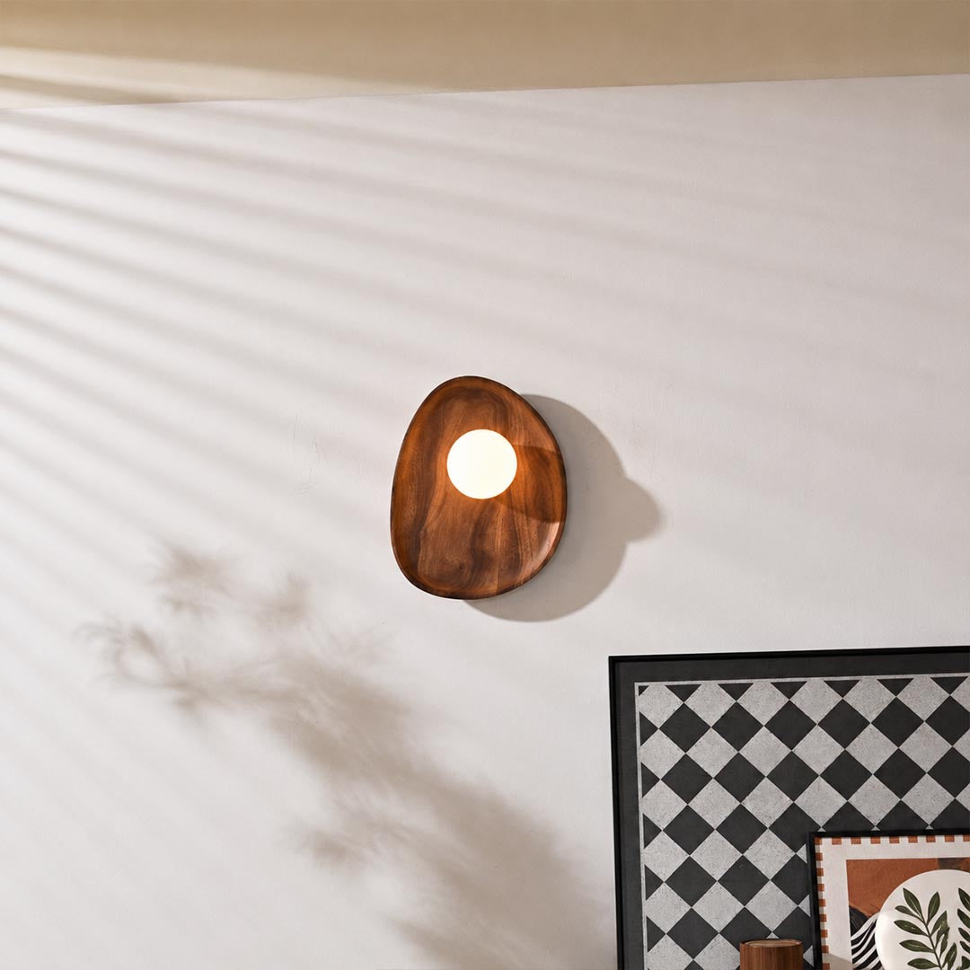 Ovi wood wall lamp walnut pair tv feature accent wall living room frosted glass globe mid century warm American home lifestyle interior
