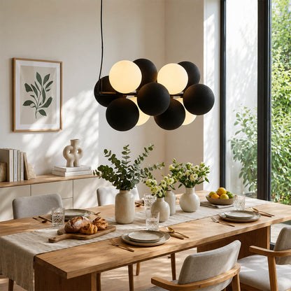 Palina vertical anthracite grey balloon bubble PVC cluster pendant modern dining room walnut table statement retro evening warm ambient lifestyle interior