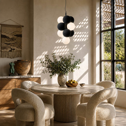 Palina vertical anthracite grey balloon bubble PVC cluster pendant modern dining room walnut table statement retro evening warm ambient lifestyle interior