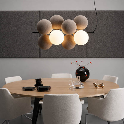 Palina vertical anthracite grey balloon bubble PVC cluster pendant modern dining room walnut table statement retro evening warm ambient lifestyle interior