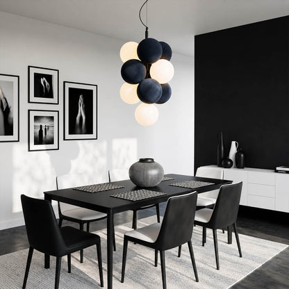 Palina vertical anthracite grey balloon bubble PVC cluster pendant modern dining room walnut table statement retro evening warm ambient lifestyle interior