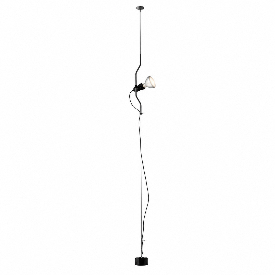 Black Parentheses floor-to-ceiling spotlight lamp on a steel cable