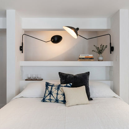 Pavo 47 inch 2 light wall sconce master bedroom centered above headboard symmetric reach over king bed matte black mid century