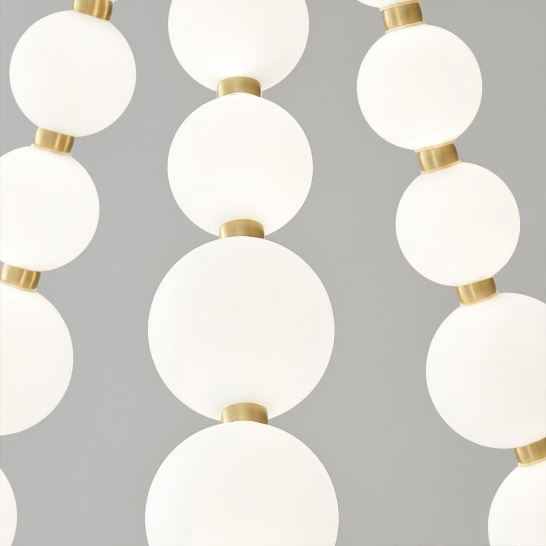 Pearla chandelier pearl finished beads brass frame strand detail close up