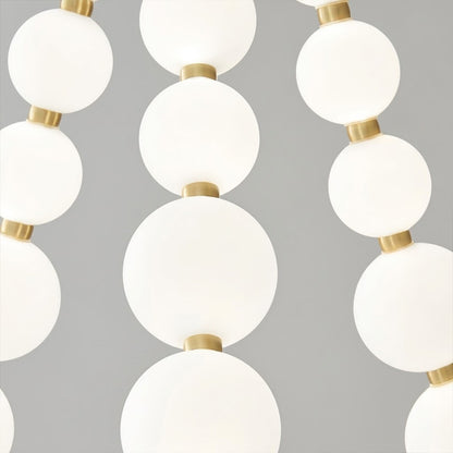 Pearla chandelier pearl finished beads brass frame strand detail close up