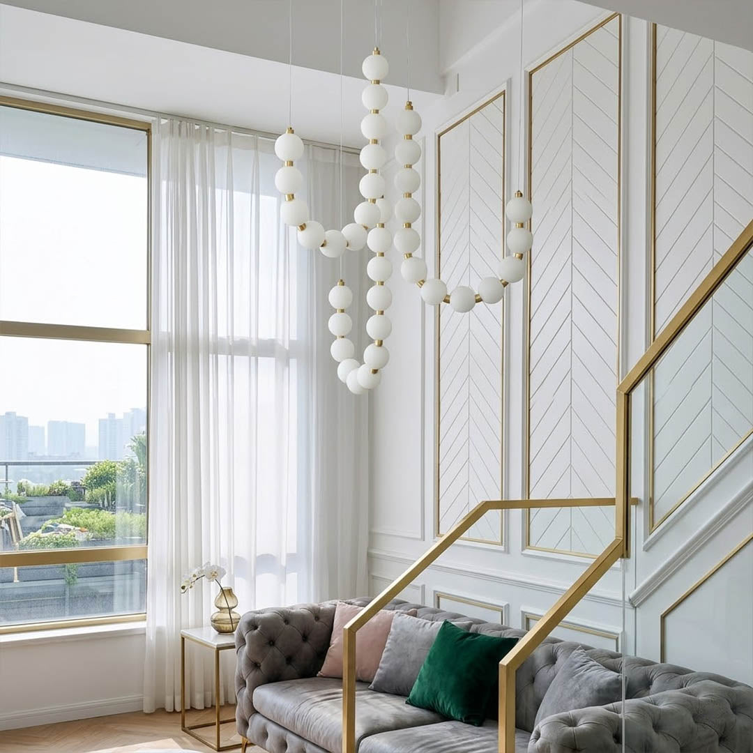 Pearla chandelier pearl finished beads brass frame strand detail close up